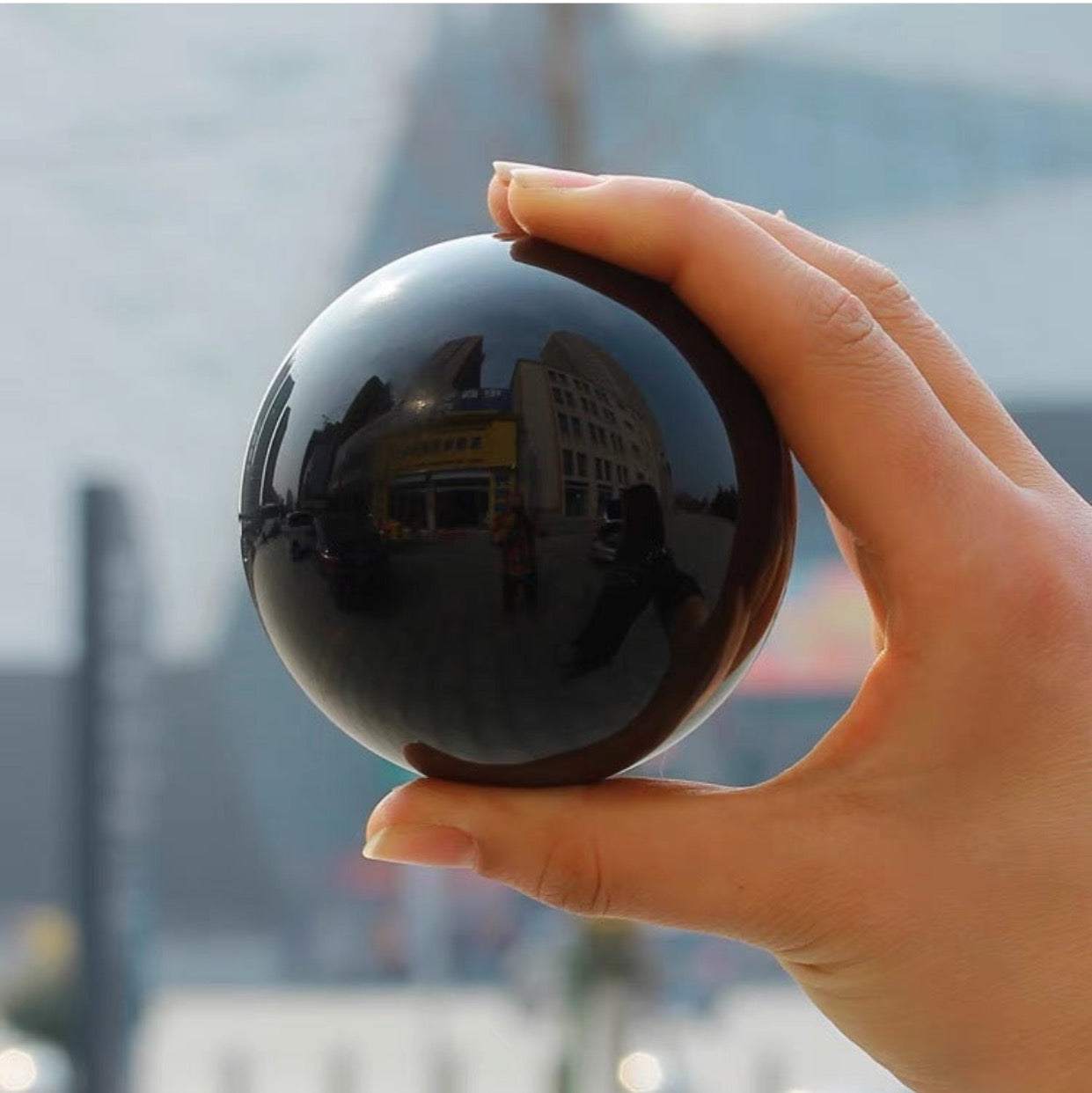 Rainbow obsidian sphere